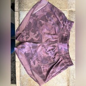 Lululemon Hotty Hot shorts.  Pink camo, size 4 tall, low rise.